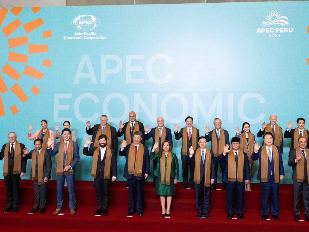 World leaders participate in the traditional family photo during the APEC summit, with Prime Minister Anthony Albanese standing on the far left. Picture: AFP