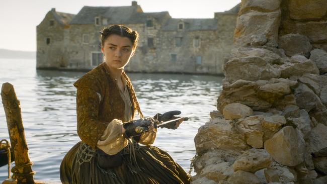 Maisie Williams looking prim and proper as Arya Stark.