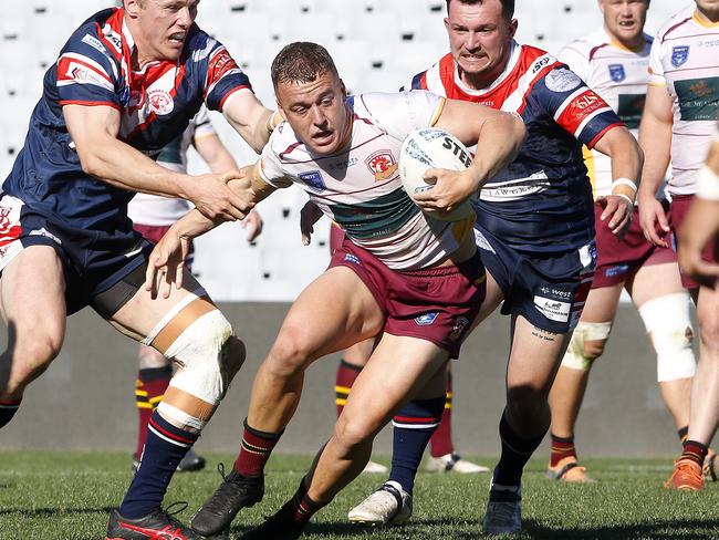 Mitchell New takes on the Camden defence in the 2023 Macarthur RL grand final. Picture: John Appleyard