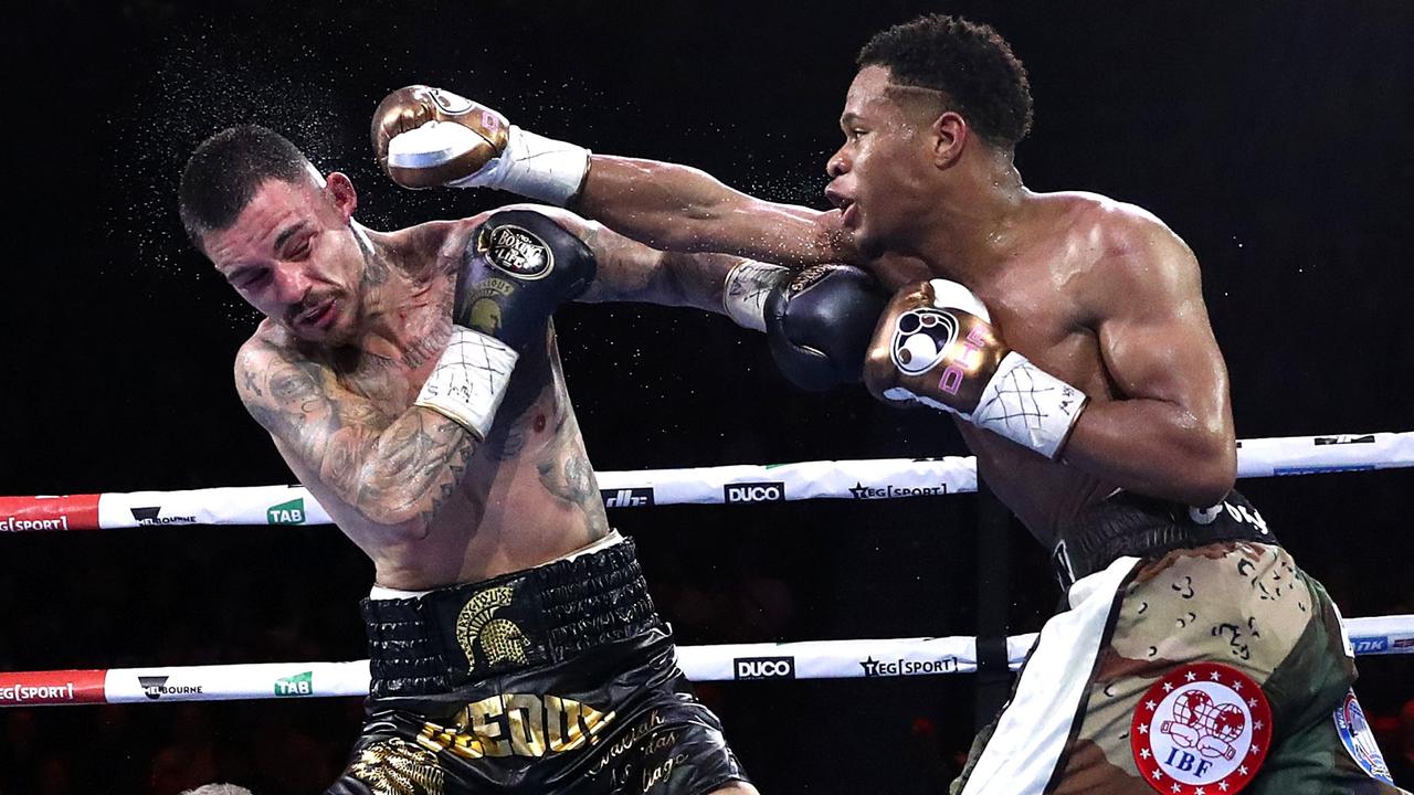 Devin Haney and George Kambosos Jr. exchange blows at Rod Laver Arena on October 16, 2022. Photo: Getty Images