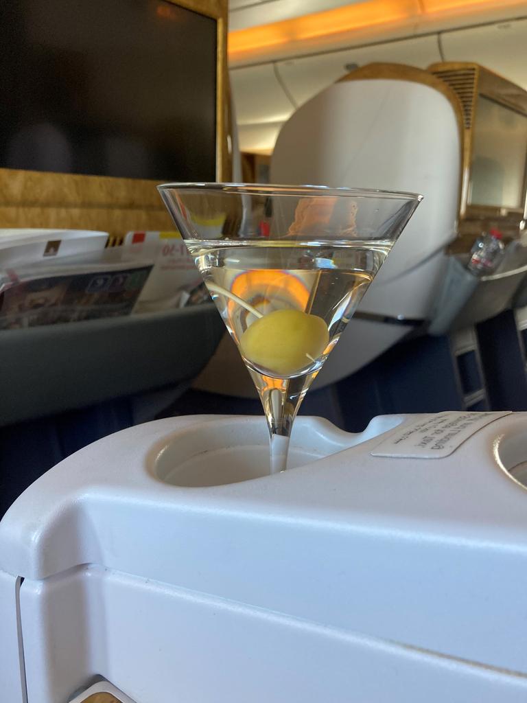 Enjoying a martini on the B777-300. Picture: news.com.au