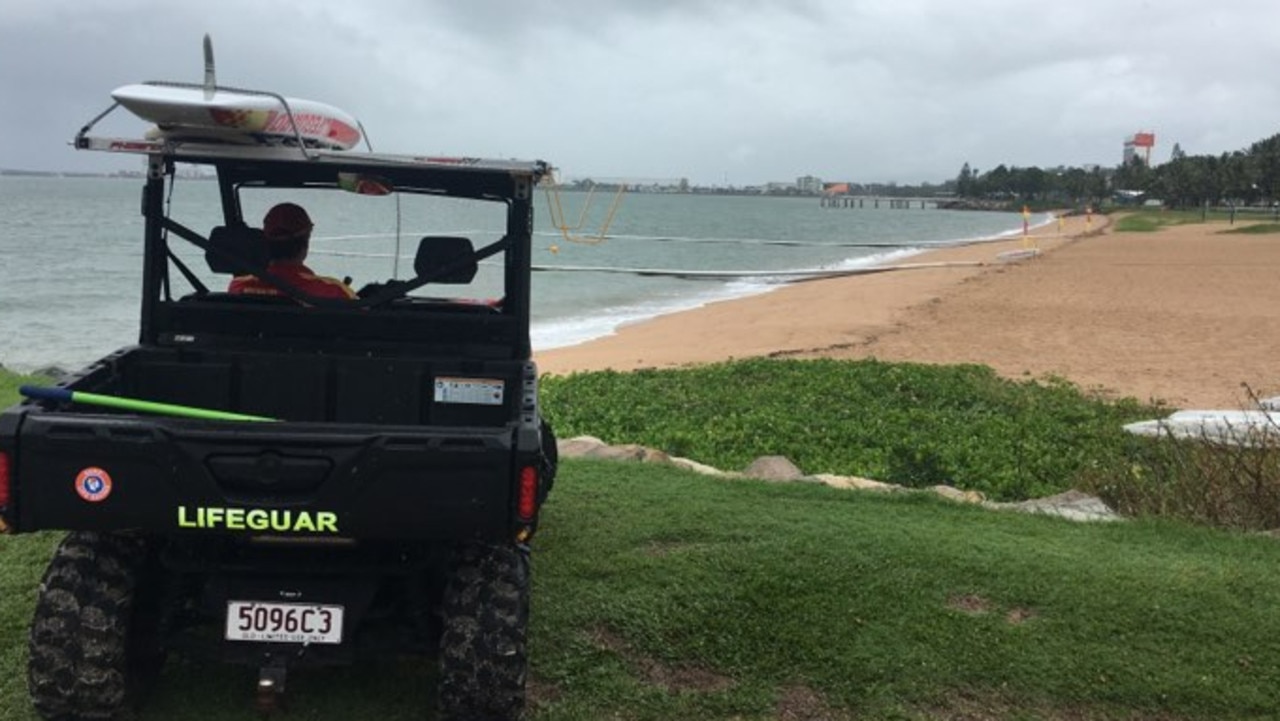 A lifeguard watches over the beach at The Strand. Picture: Evan Morgan