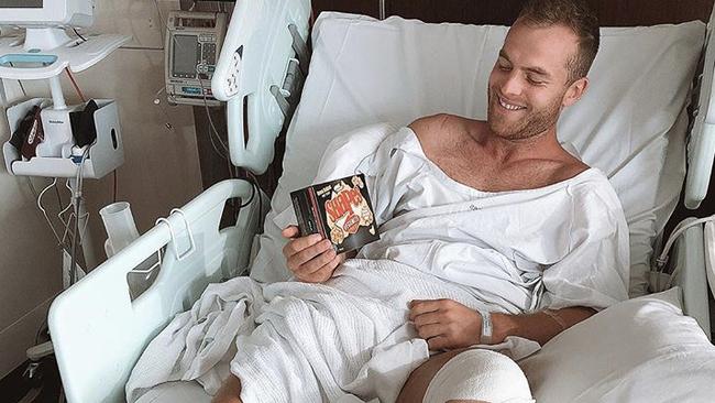 Tom Mitchell in his hospital bed after surgery to repair his broken leg. Picture: Instagram