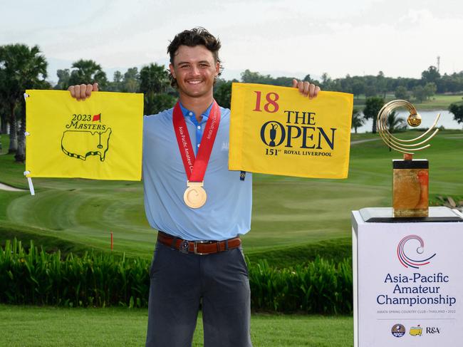 Harrison Crowe of Australia lifts the flag of The Open and The Masters following his win of the 2022 Asia-Pacific Amateur Championship being played at the Amata Spring Country Club in Thailand on Sunday, October 30, 2022. Photograph by AAC