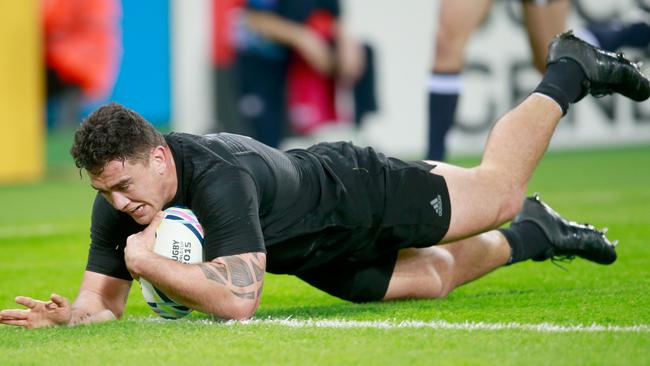 Codie Taylor of the All Blacks scores a try during the 2015 Rugby World Cup in London.