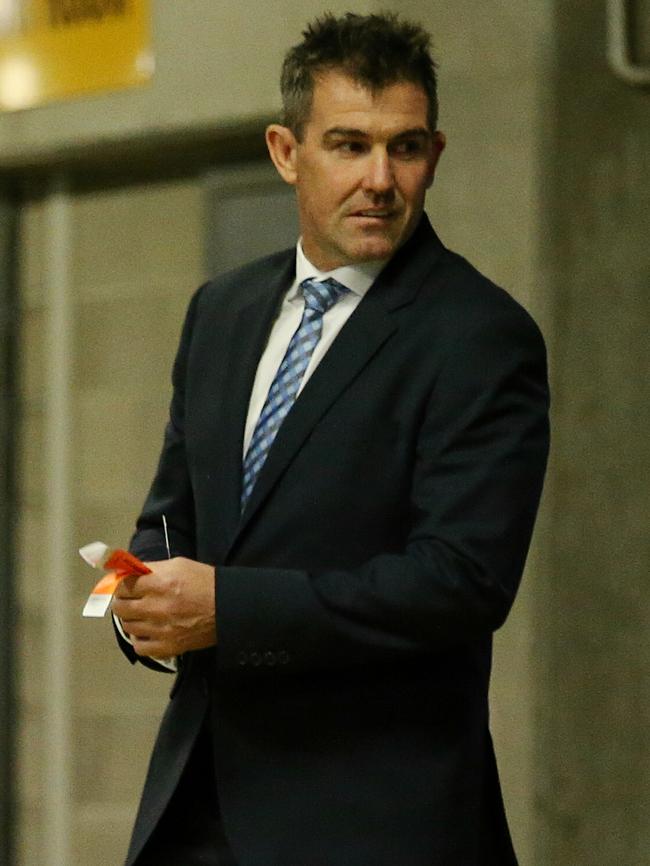 Former teammate Anthony Stevens arrives for Brent Harvey’s record-breaking game. Picture: George Salpigtidis