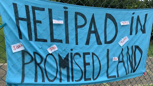 A sign on the soccer fields leading into Bellingen in 2020 in opposition to the proposed helipad at the Hermes Estate on Promised Land Rd, Gleniffer.