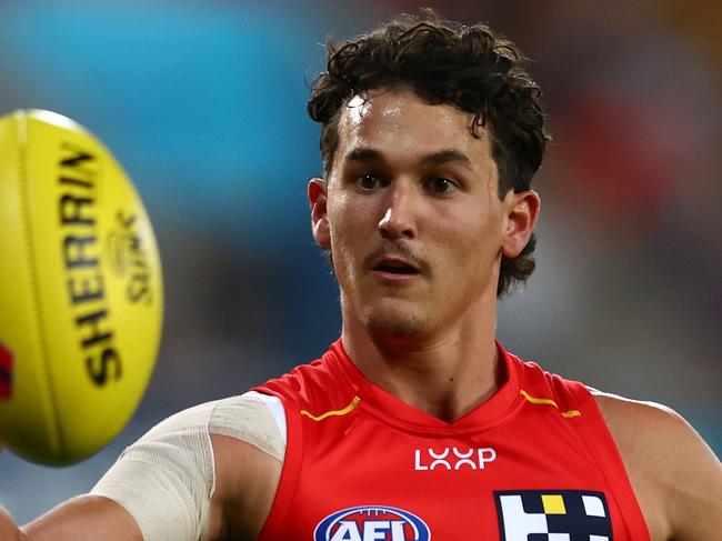 GOLD COAST, AUSTRALIA - APRIL 13: Wil Powell of the Suns warms up during the round five AFL match between Gold Coast Suns and Hawthorn Hawks at People First Stadium, on April 13, 2024, in Gold Coast, Australia. (Photo by Chris Hyde/Getty Images)