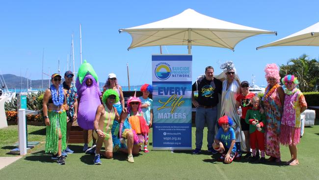 Whitsunday Suicide Prevention Network chairman Ron Petterson (centre) with walkers who took part in the inaugural walkathon, organised by the Whitsunday Triathlon Club to raise funds for the network.