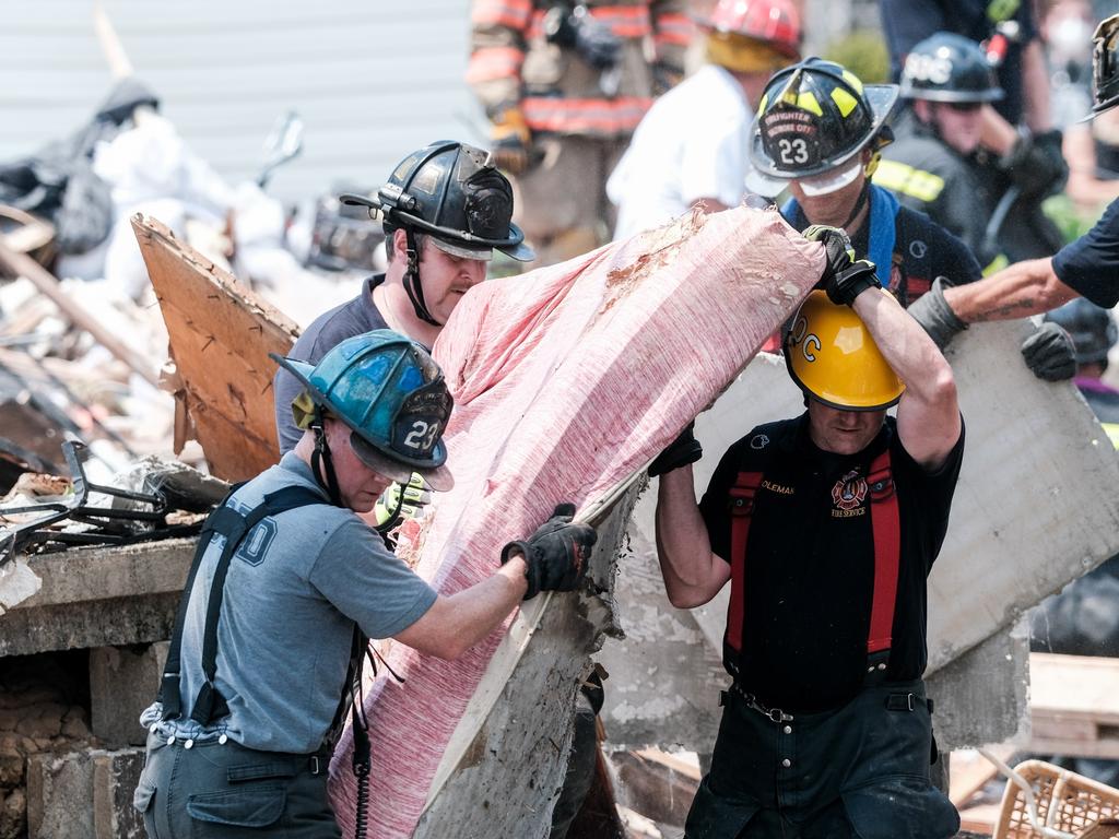 First responders search for survivors at the scene of an explosion on August 10, 2020 in Baltimore, Maryland. Picture: Michael A. McCoy/Getty Images/AFP