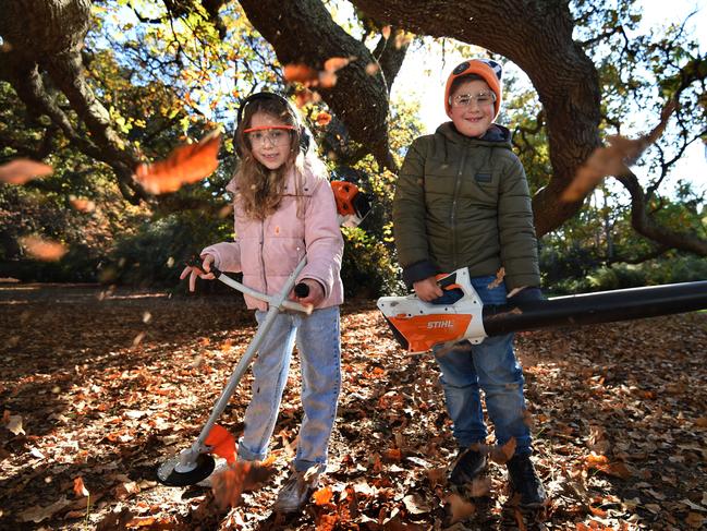 Thomas Priftis and Ally Profits get stuck into some winter gardening. Picture: Tony Gough