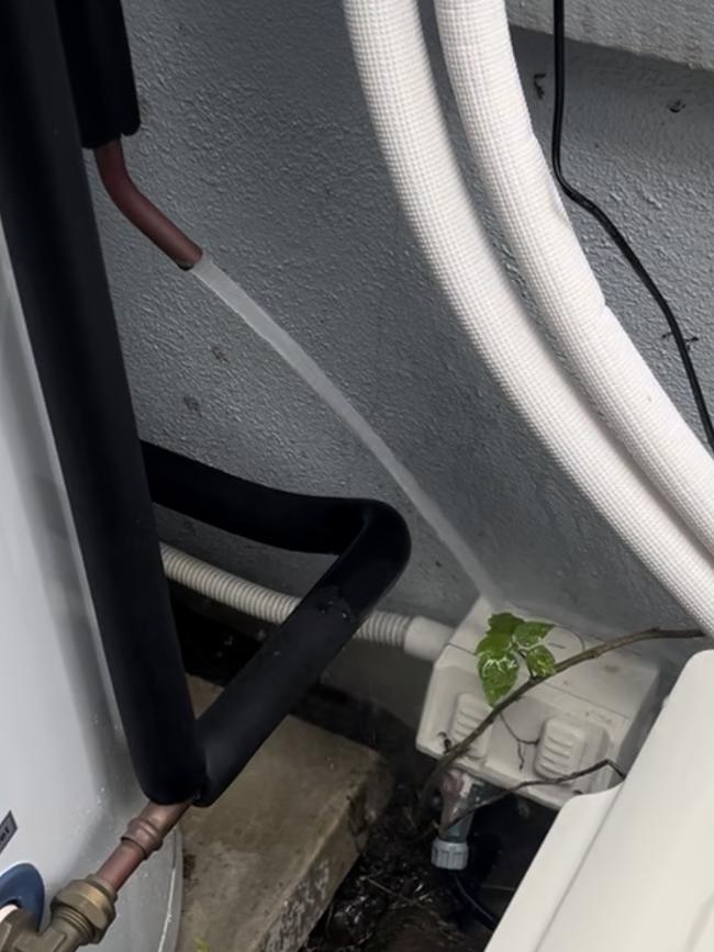 Hot water running directly onto a powerpoint at a heat pump installed in Mona Vale.
