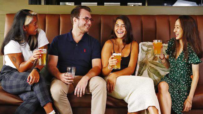 Maureen Sue (l to r), Matthew Trevitt,  and Amy Chang wholeheartedly support a beer tax cut. Picture: Sam Ruttyn