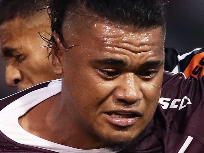 SYDNEY, AUSTRALIA - MARCH 16: Moses Suli of the Sea Eagles is tackled during the round 1 NRL match between the Wests Tigers and the Manly Warringah Sea Eagles at Leichhardt Oval on March 16, 2019 in Sydney, Australia. (Photo by Matt King/Getty Images)