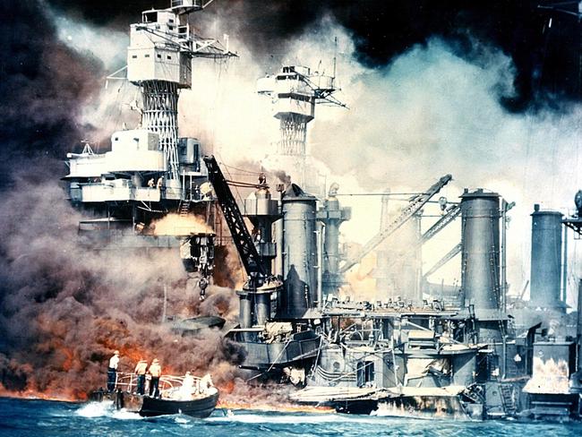 Blow to the nation ... USS West Virginia burning after the surprise Japanese attack on Pearl Harbour.