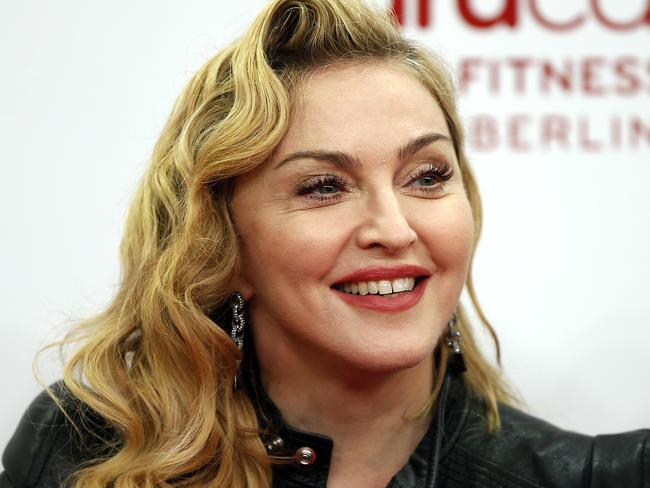 Madonna travels in a big group.