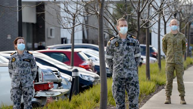 ADF personnel arrive at Epping Gardens Aged Care. Picture: Andrew Henshaw