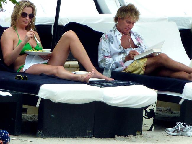 Back in Australia next year ... Penny Lancaster and Rod Stewart with family poolside at Palazzo Versace on the Gold Coast. Picture: Richard Gosling