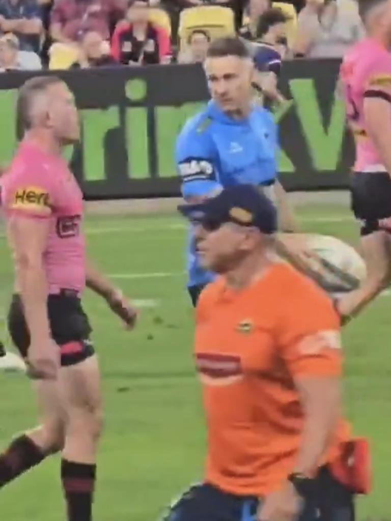 Panthers trainer Shane Elford chats to Mitch Kenny. Pic: Fox League