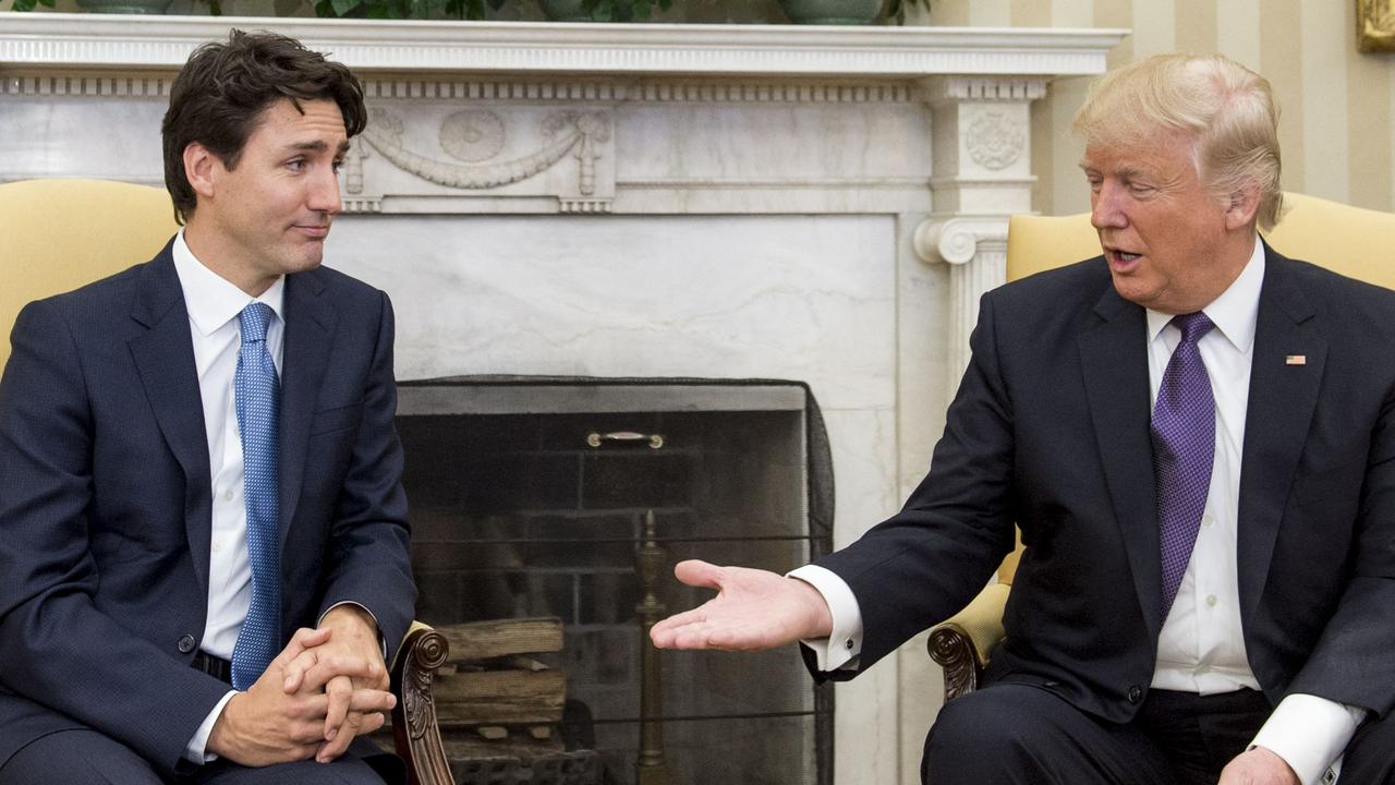 US President Donald Trump and Canadian Prime Minister Justin Trudeau meet in the Oval Office of the White House last month. Picture: Saul Loeb/AFP