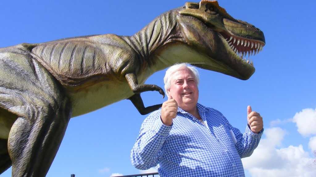 Clive Palmer with the dinosaur Jeff, during the 2012 PGA at Palmer Coolum Resort. Photo Richard Bruinsma / Sunshine Coast Daily. Picture: Richard Bruinsma