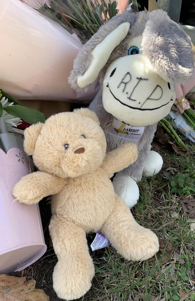 Tributes left by family, friends and members of the community at the house where Tayla Cox and baby Murphy Margaret lived before allegedly murdered on August 8, 2023.