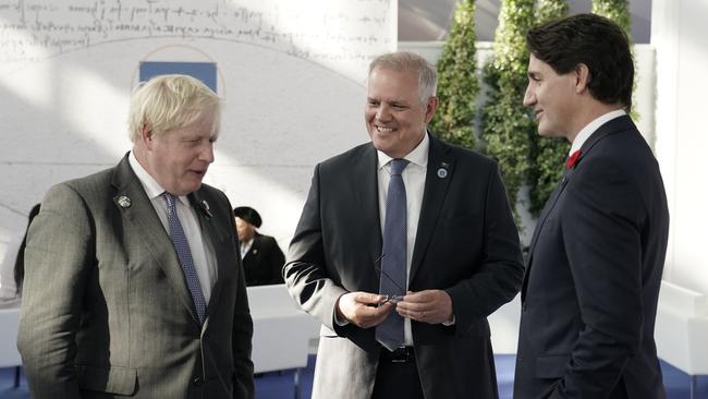 Australian Prime Minister Scott Morrison attends the G20 Official Welcome and Family photo and chats with Boris Johnson and Justin Trudeau in Rome on Saturday, October 30, 2021. Picture: Adam Taylor