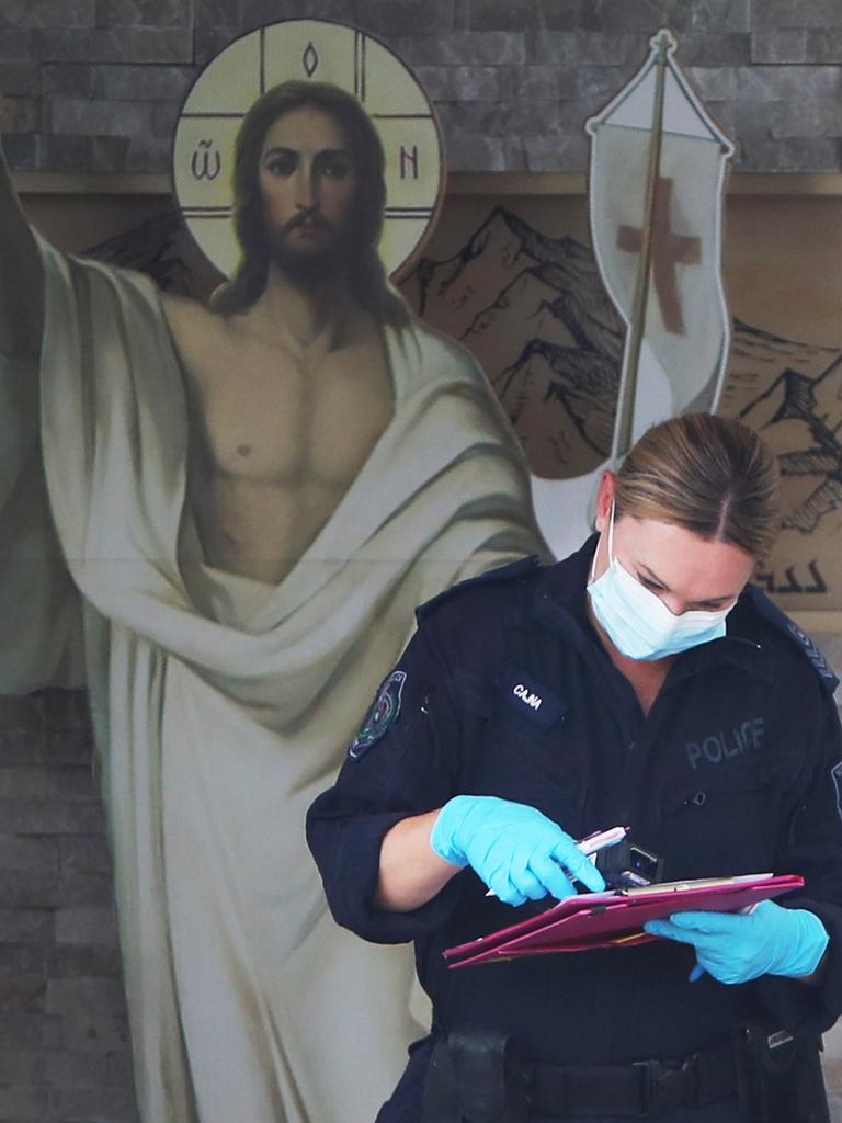 Forensic police collect evidence on Tuesday at the church. Picture: Getty Images