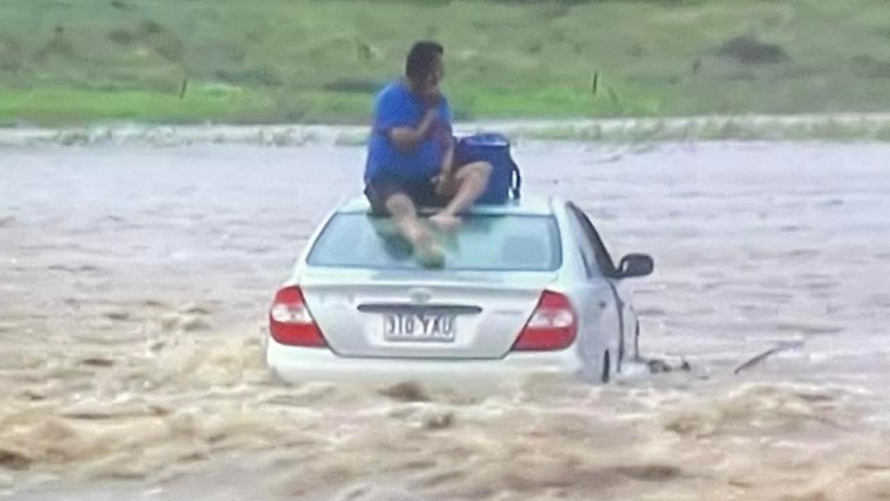 A man stranded in floodwaters near Toowoomba. Picture: 7 News