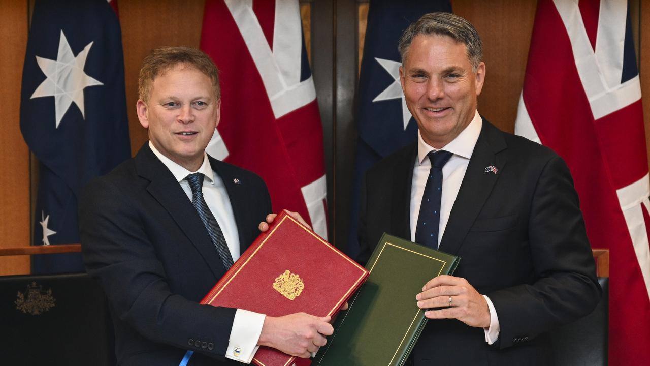 Mr Marles and Mr Shapps signed the defence deal on Thursday. Picture: NCA NewsWire / Martin Ollman