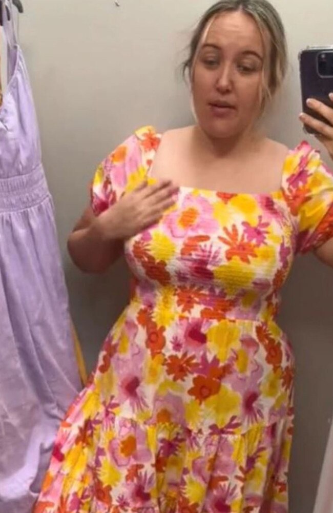 A summery yellow, orange and pink floral print dress from Big W has also garnered attention recently. Picture: TikTok