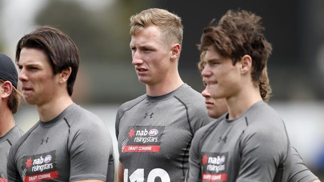 Josh Treacy from Bendigo Pioneers listens intently.