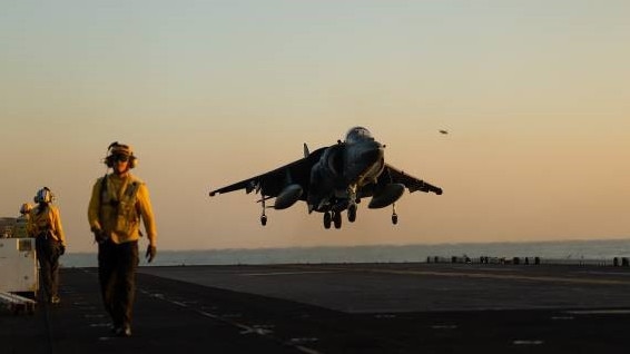 An AV-8B Harrier aircraft, attached to Marine Medium Tilt Rotor Squadron 162 lands on the flight deck of the Wasp-class amphibious assault ship USS Bataan in the Red Sea. Picture: Us Central Command.