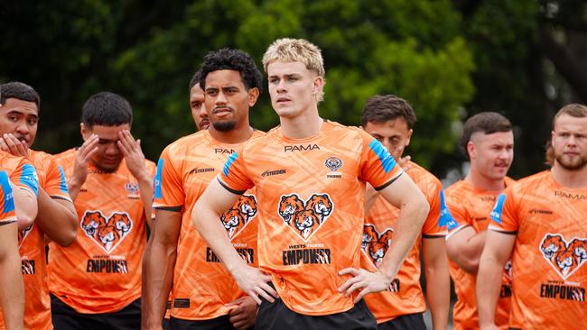 Lachlan Galvin (centre) on the first day of Tigers pre-season training. Photo: Wests Tigers