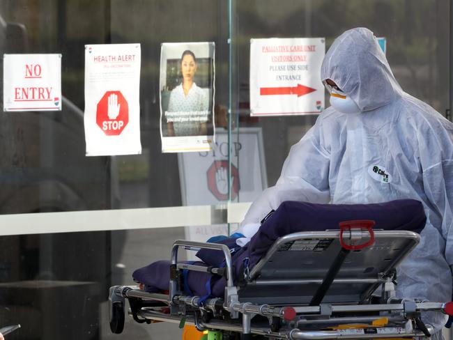 A tribunal ruled the nurse should have stopped the baby shower. Pictured is a medical worker responding to an outbreak at the facility in 2020. Picture: David Crosling