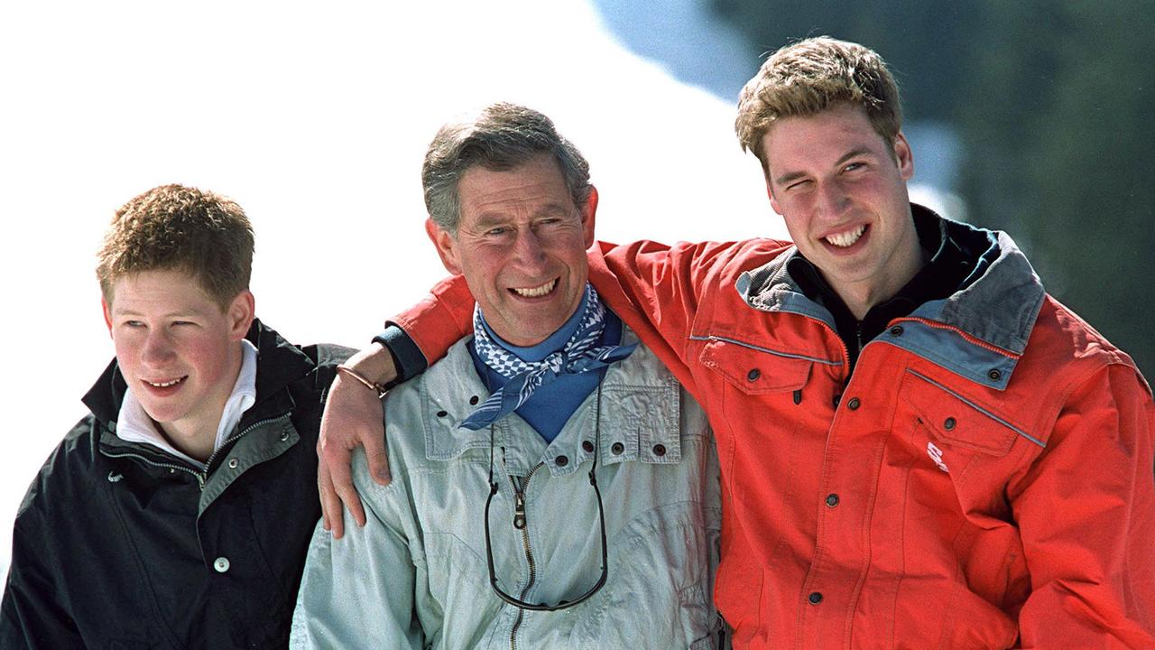 Harry, Charles and William in Klosters on March 29, 2002 - one day before the Queen Mother’s death. Picture: UK Press/Getty Images