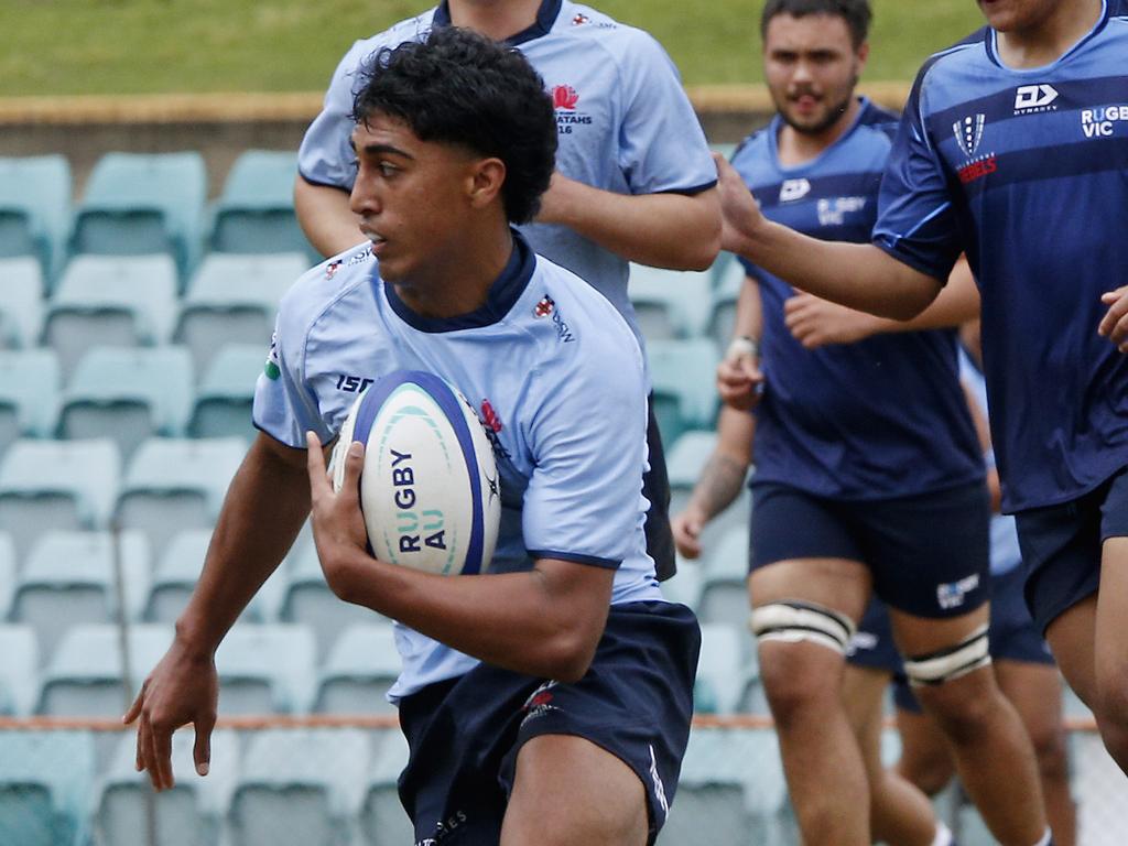 Ashton Large carrying the ball for the U16s Waratahs. Picture: John Appleyard.