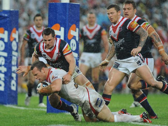 Dean Young puts the result beyond doubt with his try in the 62nd minute. AAP Image/Dan Himbrechts