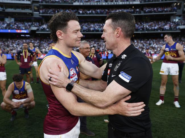 MELBOURNE, AUSTRALIA - SEPTEMBER 30: Lachie Neale of the Lions congratulates Magpies head coach Craig McRae after the 2023 AFL Grand Final match between Collingwood Magpies and Brisbane Lions at Melbourne Cricket Ground, on September 30, 2023, in Melbourne, Australia. (Photo by Daniel Pockett/AFL Photos/via Getty Images)