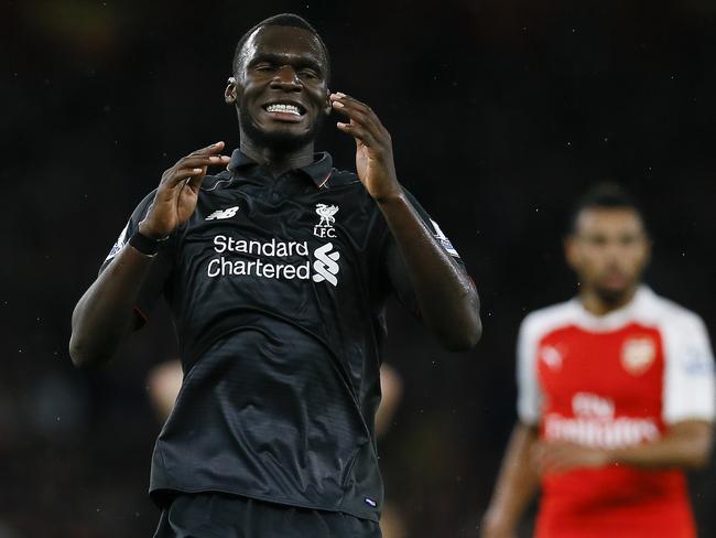 Liverpool's Christian Benteke reacts after he fails to score a goal.