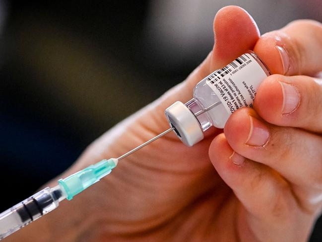 A nurse prepares a dose of the Pfizer-BioNTech COVID-19 vaccine in Belgium. Picture: AFP