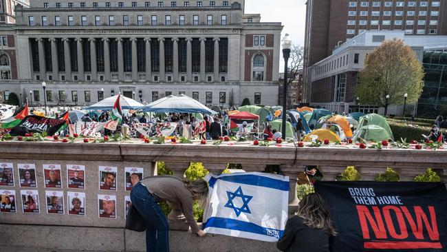 People set up a makeshift memorial at Columbia University for Jewish hostages taken by Hamas. Picture: Getty Images/AFP