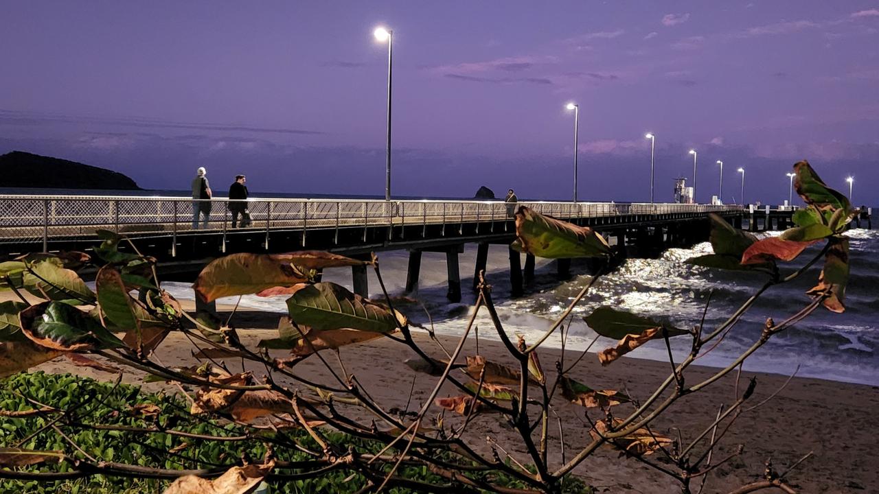 Boy rescued after falling from Palm Cove jetty on his bike | Herald Sun