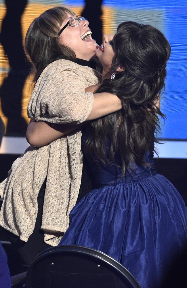 Sinuhe Cabello, left, hugs her daughter Camila Cabello. Picture: AP