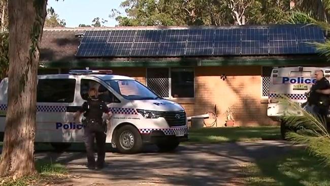 Police outside the Sheldon home where a woman was the victim of a terrifying home invasion. Picture: 7 News