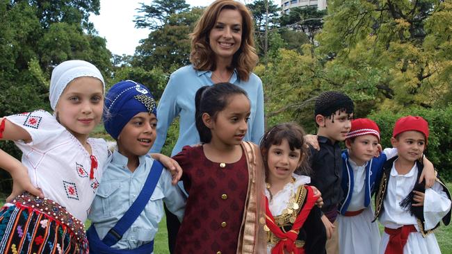 Victorian Multicultural Commission chairperson Helen Kapalos with primary school kids celebrating Cultural Diversity Week.