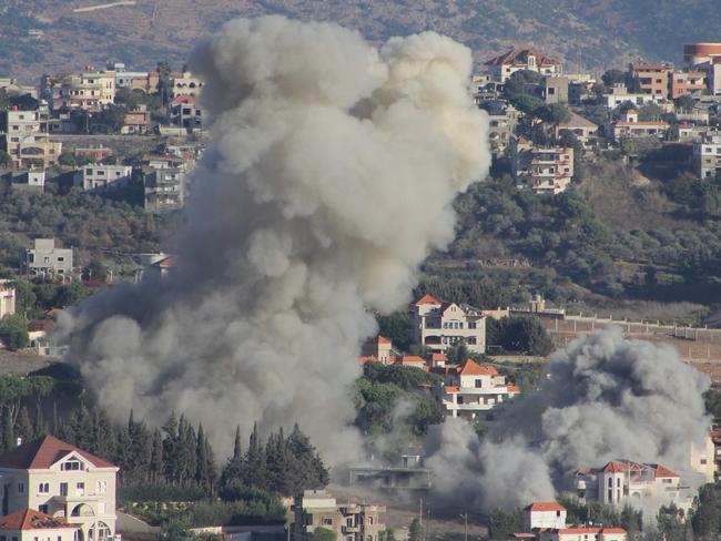 TOPSHOT - Smoke rises from the site of an Israeli airstrike that targeted the southern Lebanese village of Khiam on October 21, 2024. (Photo by AFP)