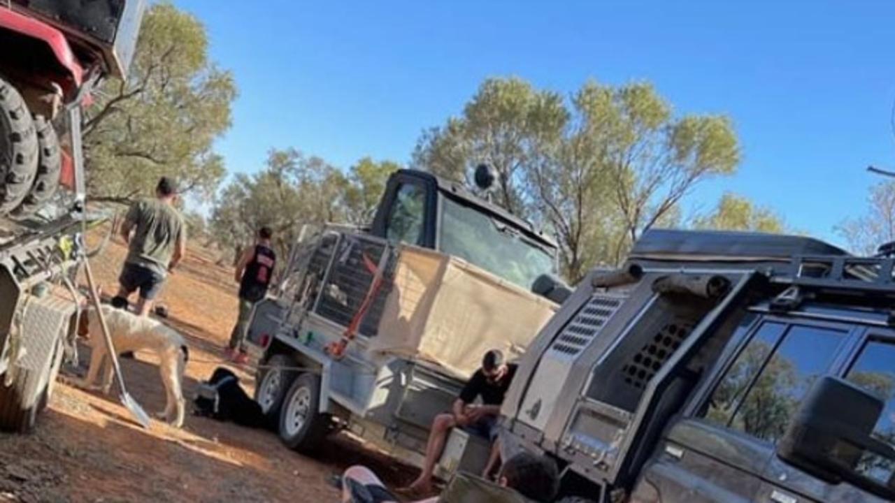 The last photo taken of Mr Rivers (left, in black shorts) before he disappeared on the trip to the NT. Picture: Supplied