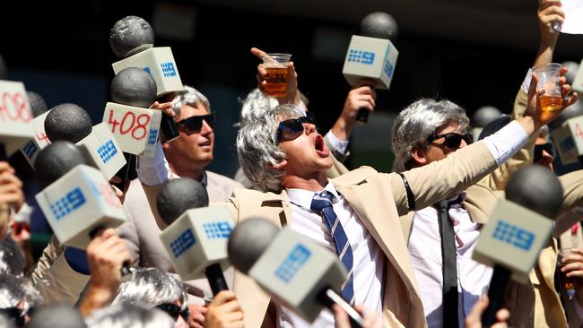 Day 2 of the Australia vs India Test Series Cricket match at Sydney Cricket Ground today. Pictured are 'The Richies', Dozens of Richie Benaud impersonators, enjoying the match as Smith makes his 100. Photo: Tim Hunter.