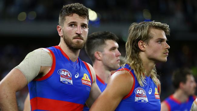 PERTH, AUSTRALIA - SEPTEMBER 25: Marcus Bontempelli and Bailey Smith of the Bulldogs look dejected after the 2021 Toyota AFL Grand Final match between the Melbourne Demons and the Western Bulldogs at Optus Stadium on September 25, 2021 in Perth, Australia. (Photo by Gary Day/AFL Photos via Getty Images)